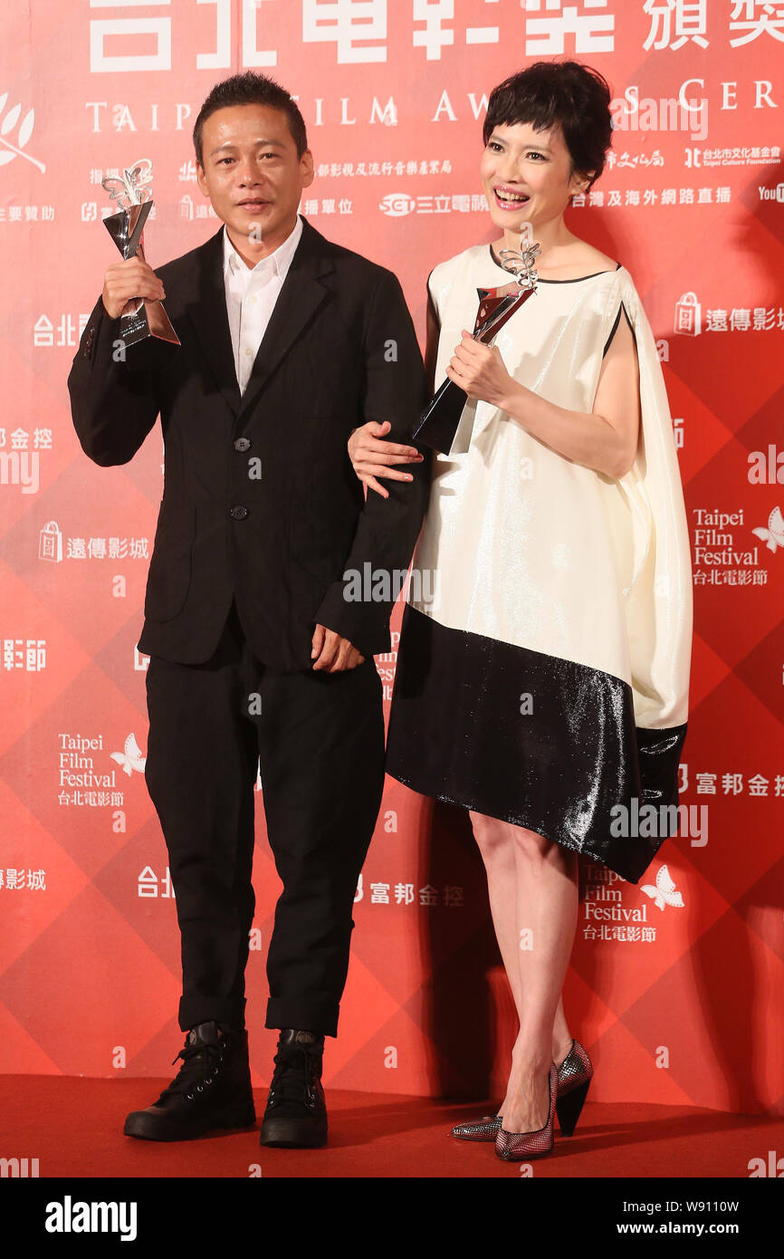 Taiwanese actor Lee Kang Sheng, left, and Taiwanese actress Chen  Shiang-chyi hold their trophies for Best Actor and Best Actress awards on  the red car Stock Photo - Alamy