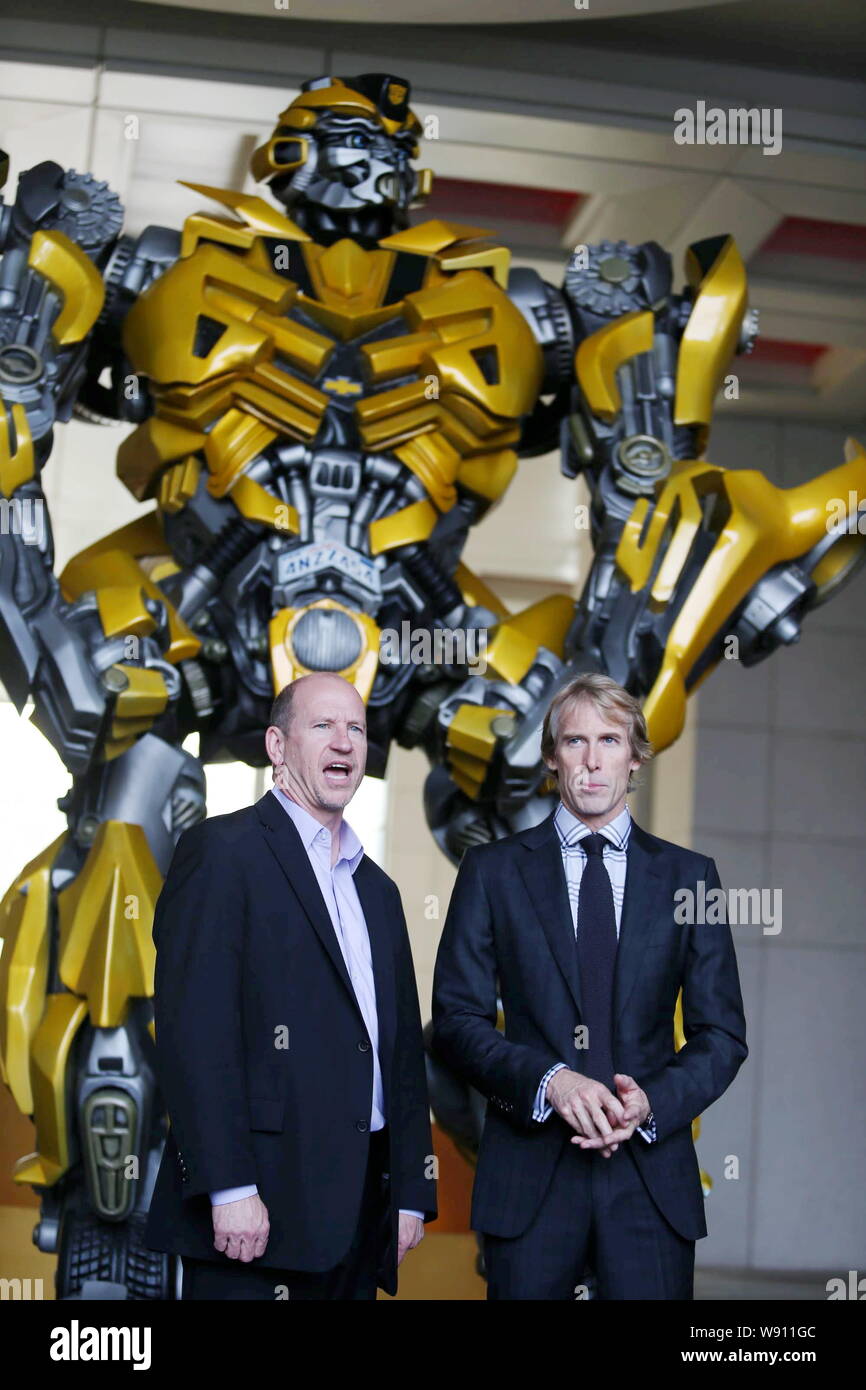 Rob Moore, left, Vice Chairman of Paramount Pictures, speaks next to American director Michael Bay at a press conference for the Beijing premiere of t Stock Photo