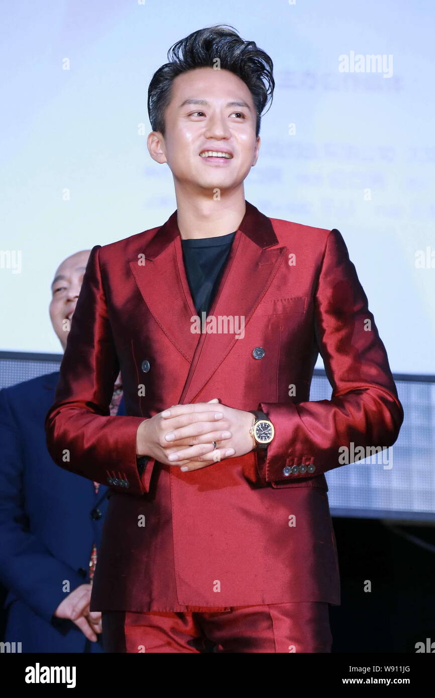 Chinese Actor And Director Deng Chao Poses At The Premiere For His Movie The Breakup Guru In Shanghai China 23 June 2014 Stock Photo Alamy