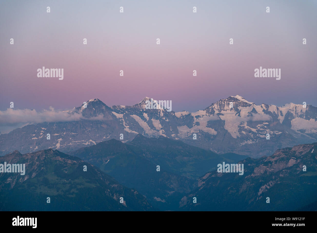 Abendrot über Eiger Mönch und Jungfrau Stock Photo