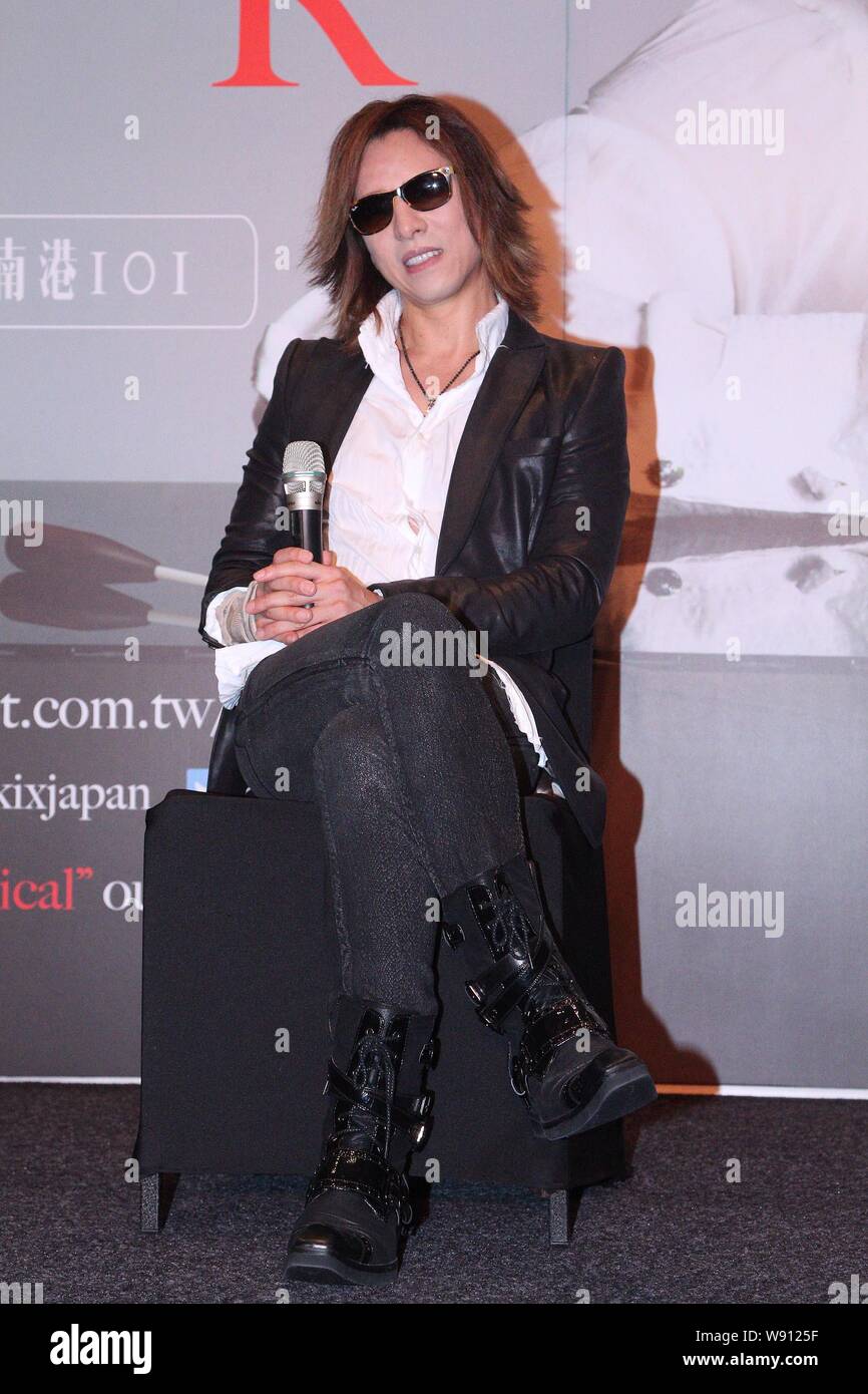 Yoshiki of Japanese heavy metal band X Japan poses at a press conference for the Taipei concert