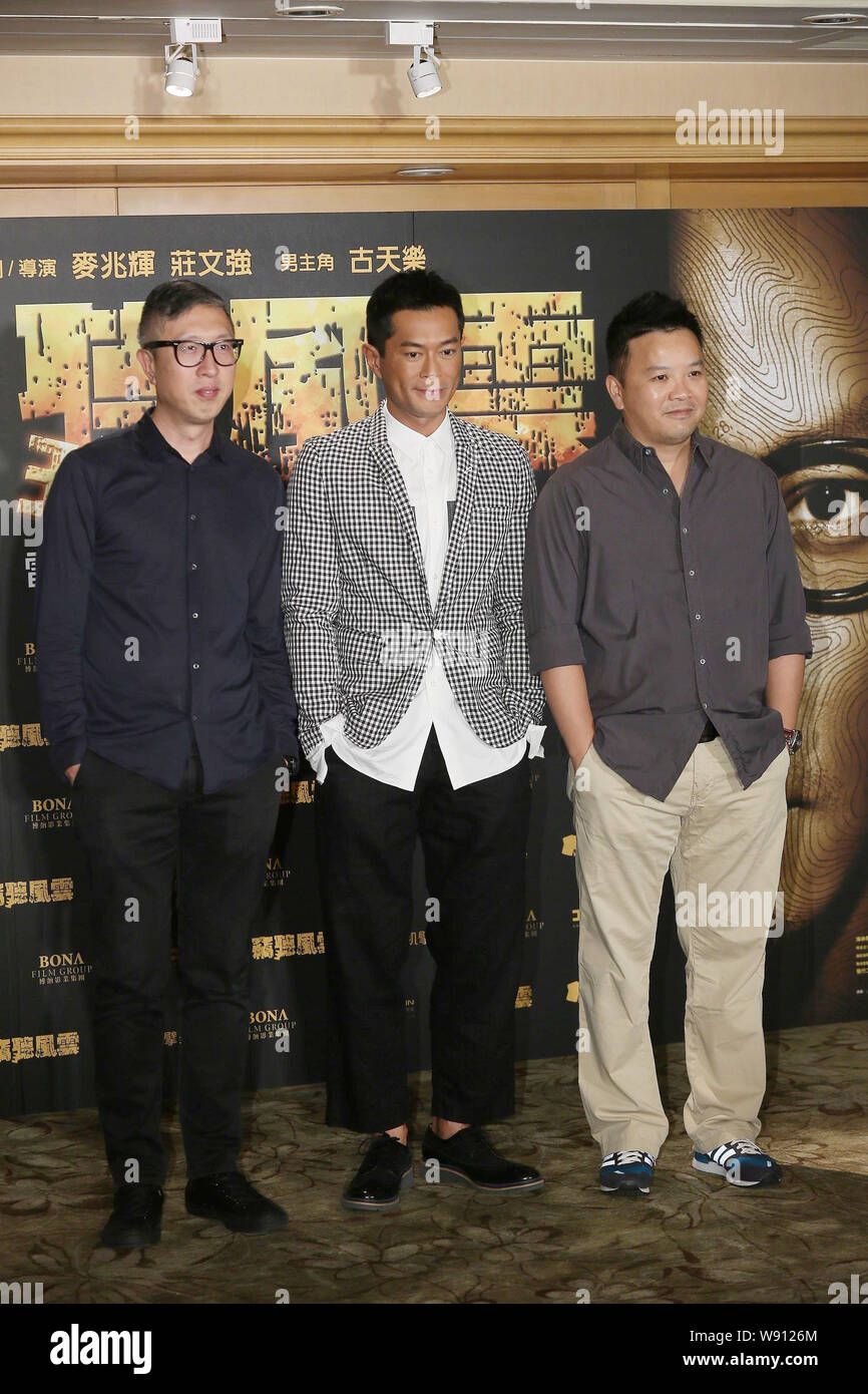 (From left) Hong Kong director Felix Chong Man-keung, Hong Kong actor Louis Koo and Hong Kong director Alan Mak Siu-fai pose during a press conference Stock Photo