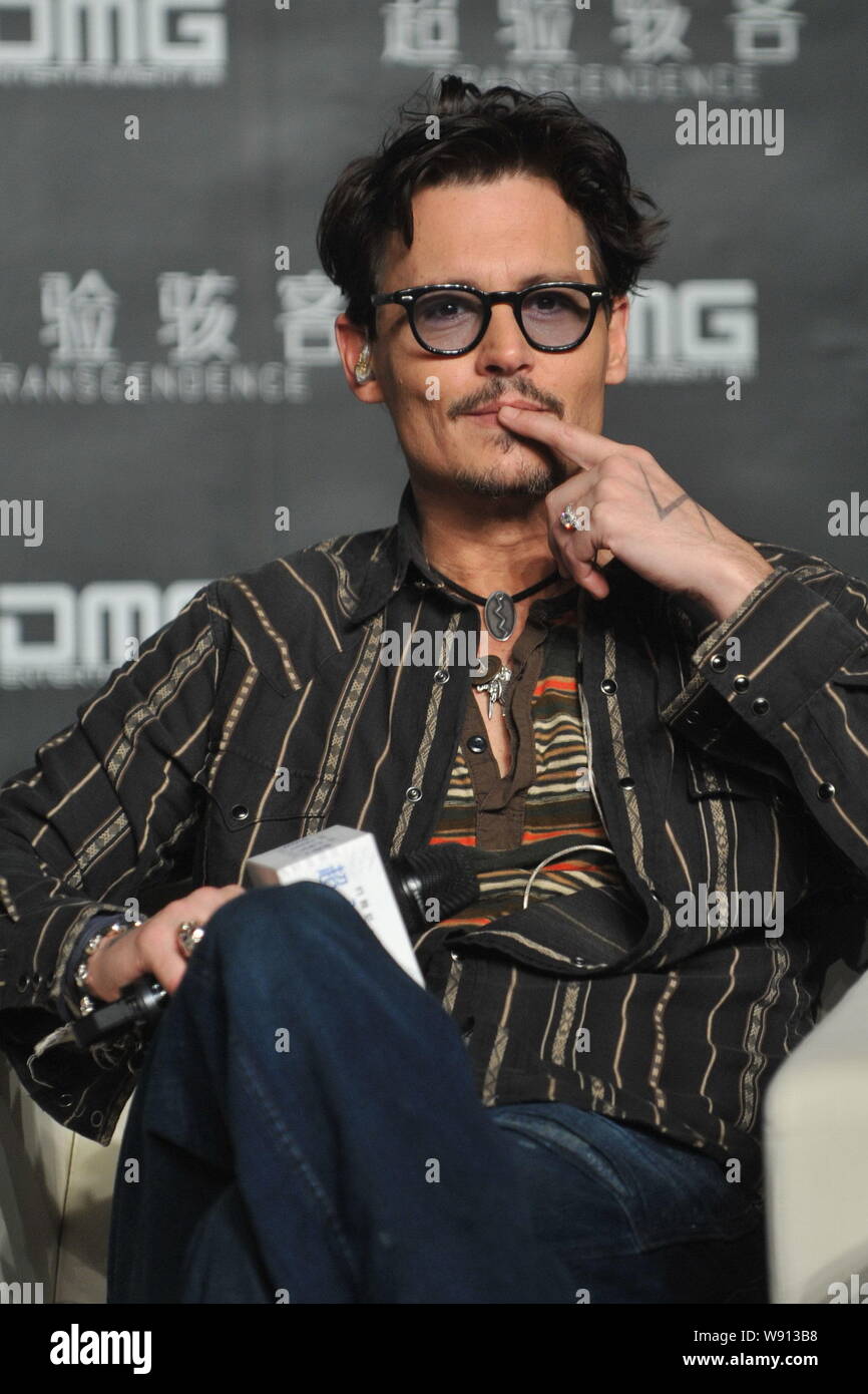 American actor Johnny Depp attends a press conference for his movie, Transcendence, in Beijing, China, 31 March 2014. Stock Photo