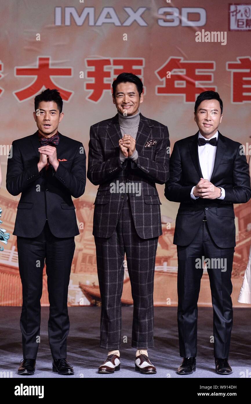 (From left) Hong Kong actor Aaron Kwok, Chow Yun-fat and Donnie Yen pose during a premiere for their new movie, The Monkey King, in Beijing, China, 19 Stock Photo