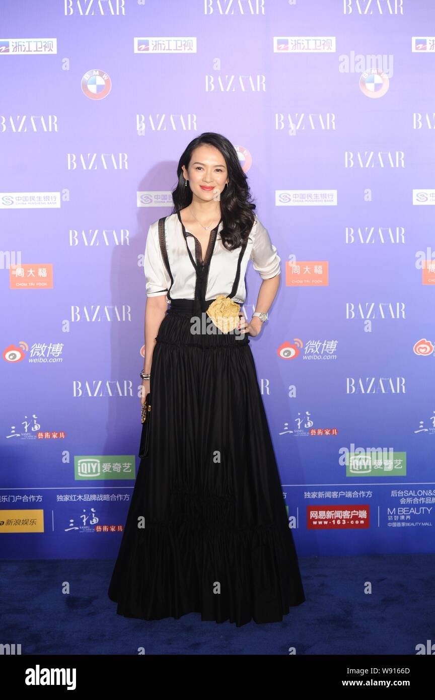 Chinese actress Zhang Ziyi poses on the red carpet of the 2014 Bazaar Charity Night in Beijing, China, 19 September 2014. Stock Photo
