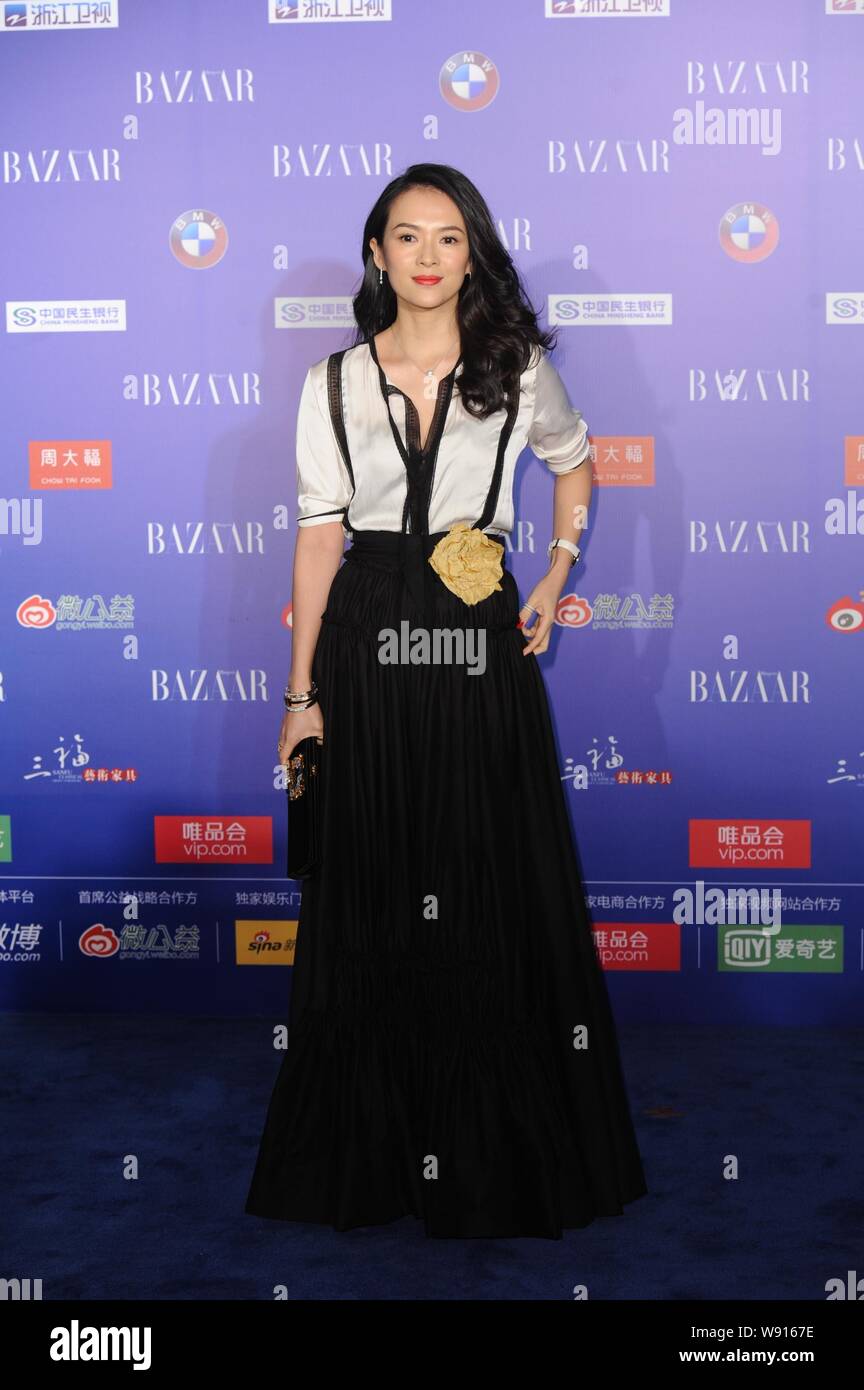 Chinese actress Zhang Ziyi poses on the red carpet of the 2014 Bazaar Charity Night in Beijing, China, 19 September 2014. Stock Photo