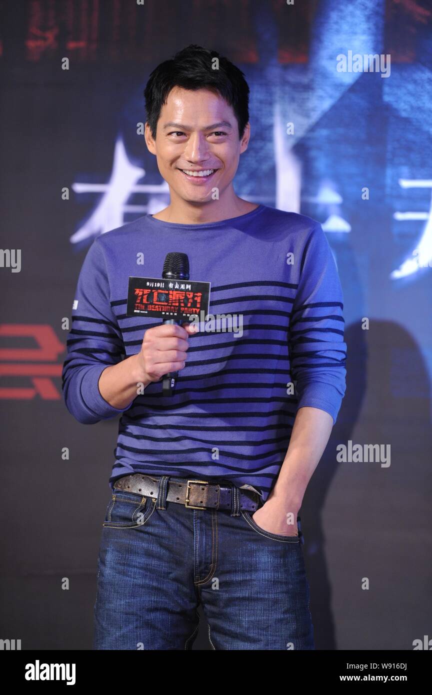 American actor Archie Kao, the husband of Chinese actress Zhou Xun, smiles during a press conference for his new movie, The Deathday Party, in Beijing Stock Photo