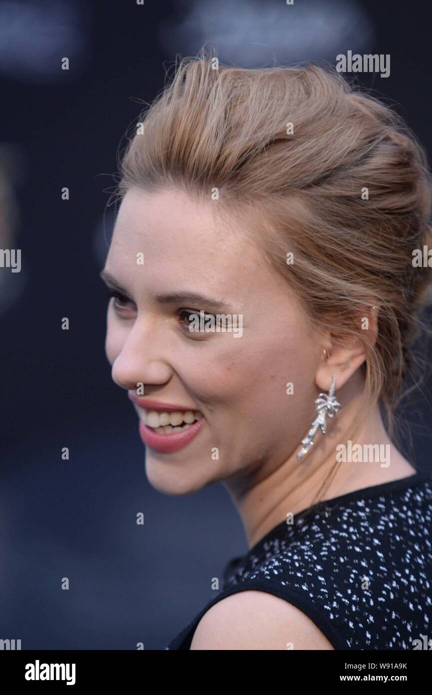American actress Scarlett Johansson smiles during a press conference for  her new movie, Captain America: The Winter Soldier, in Beijing, China, 24  Mar Stock Photo - Alamy