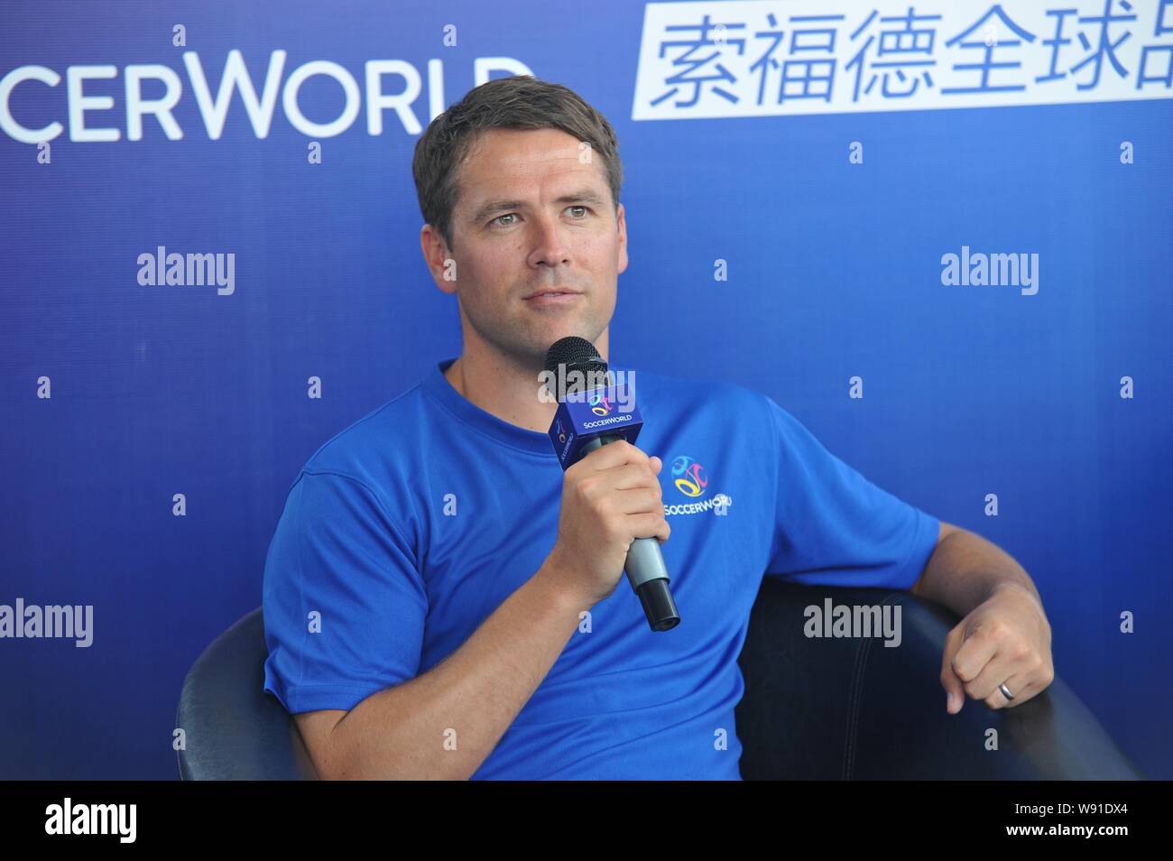 English soccer star Michael Owen speaks at a promotional event of European sports stadium business operator SoccerWorld during his China tour in Beiji Stock Photo