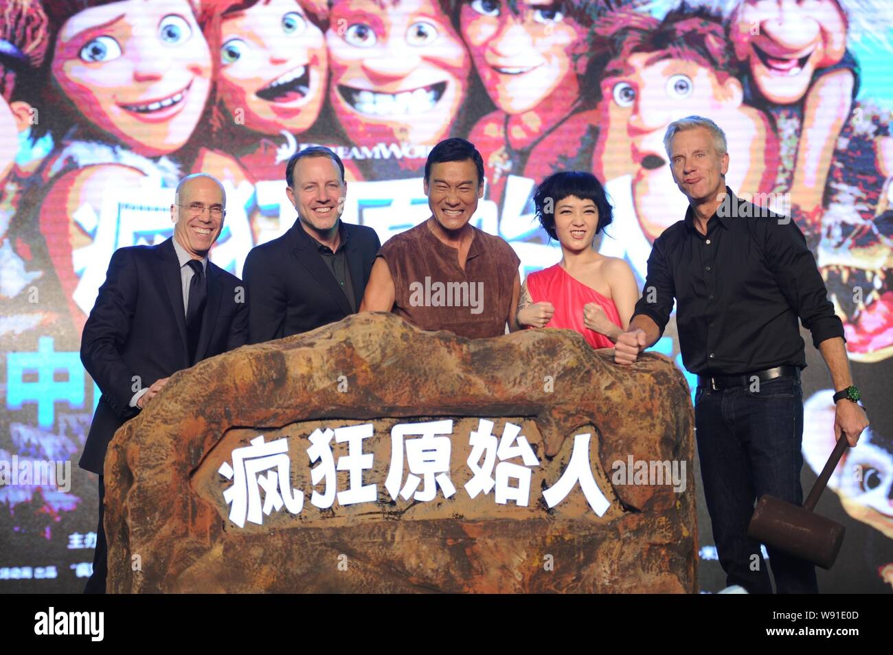 (From left) Jeffrey Katzenberg, CEO of DreamWorks SKG, American director, Kirk De Micco, Hong Kong actor Tony Leung, Taiwanese actress and singer Mavi Stock Photo