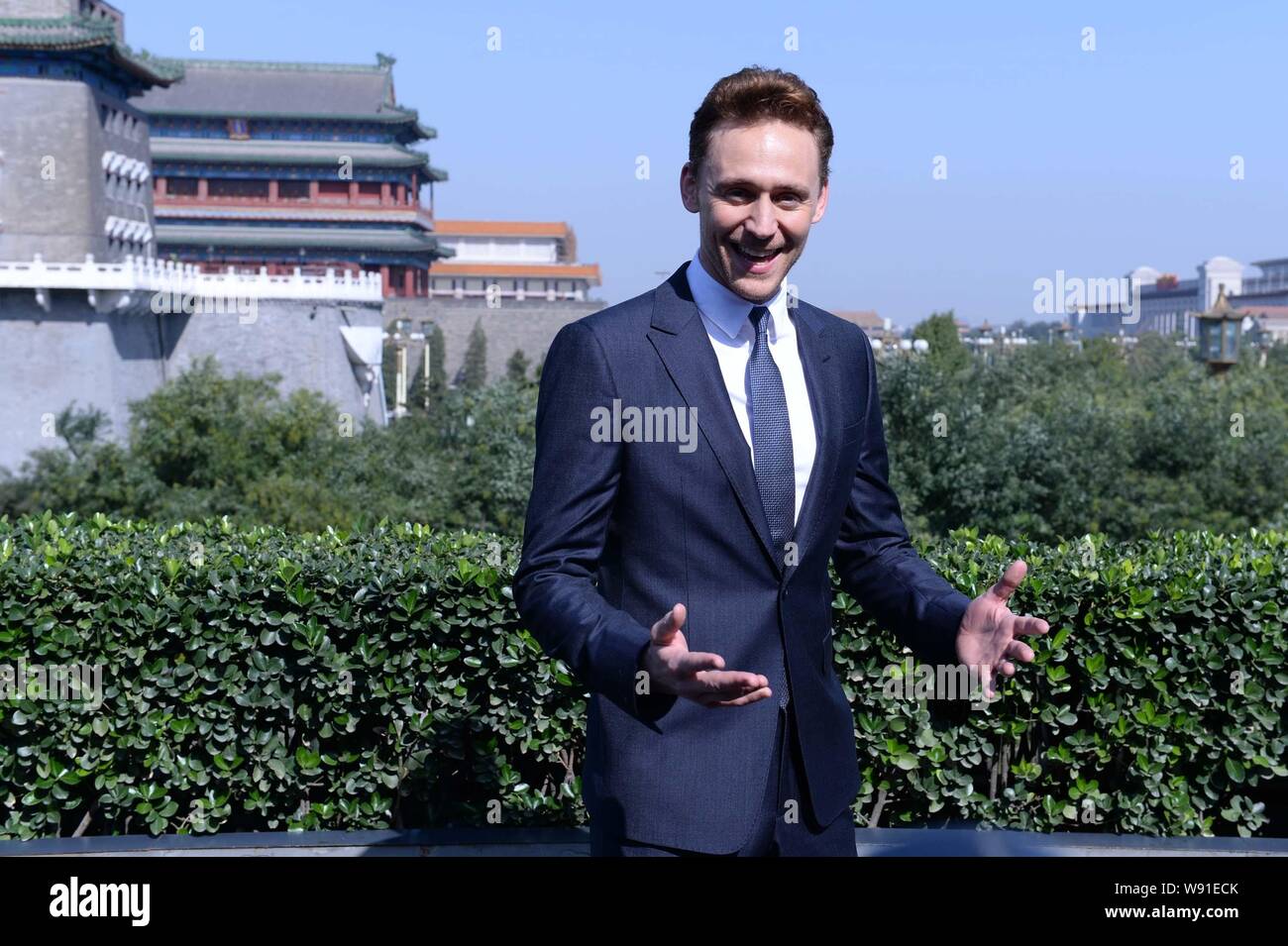 English actor Tom Hiddleston poses during a photocall to promote his new movie, Thor: The Dark World, in front of Zhengyang Gate in Beijing, China, 11 Stock Photo
