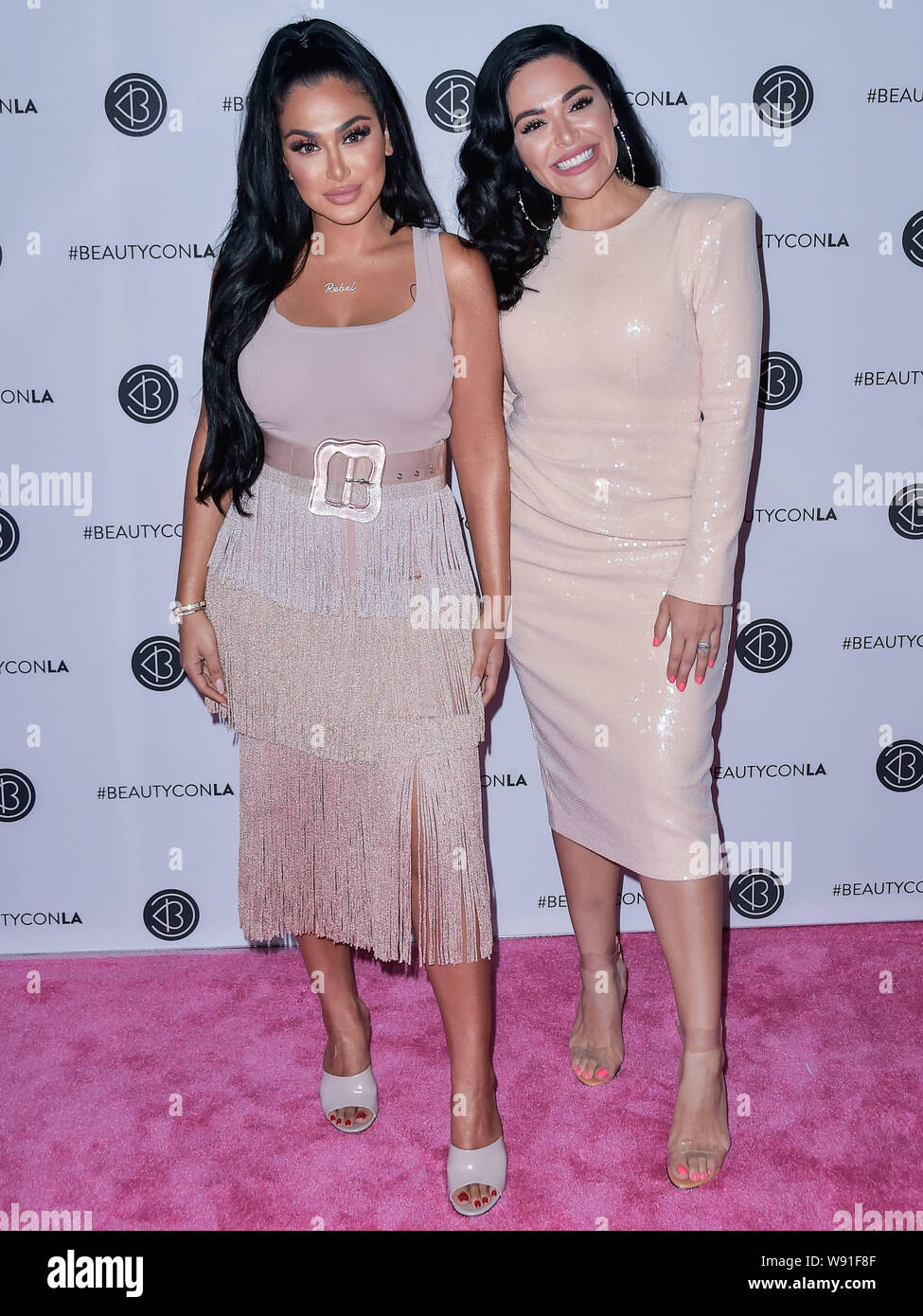 Los Angeles, United States. 11th Aug, 2019. LOS ANGELES, CALIFORNIA, USA - AUGUST 11: Huda Kattan and Mona Kattan arrive at the Beautycon Festival Los Angeles 2019 - Day 2 held at the Los Angeles Convention Center on August 11, 2019 in Los Angeles, California, United States. ( Credit: Image Press Agency/Alamy Live News Stock Photo