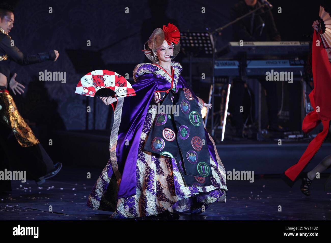 Japanese singer Kumi Koda performs during her Taiwan Live 2013 concert in Taipei, Taiwan, 12 October 2013. Stock Photo