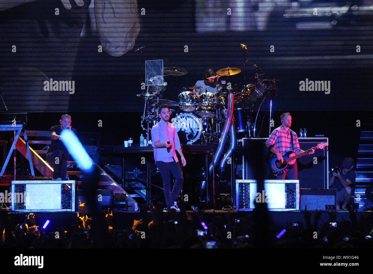 Members of American rock band Linkin Park perform during a concert in Taipei, Taiwan, 17 August 2013. Stock Photo