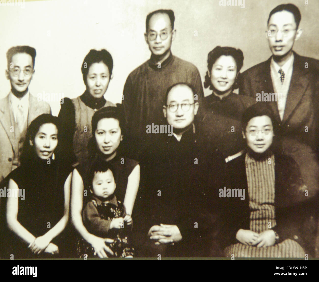 This file is reproduced from a black and white family photo of Zeng ...