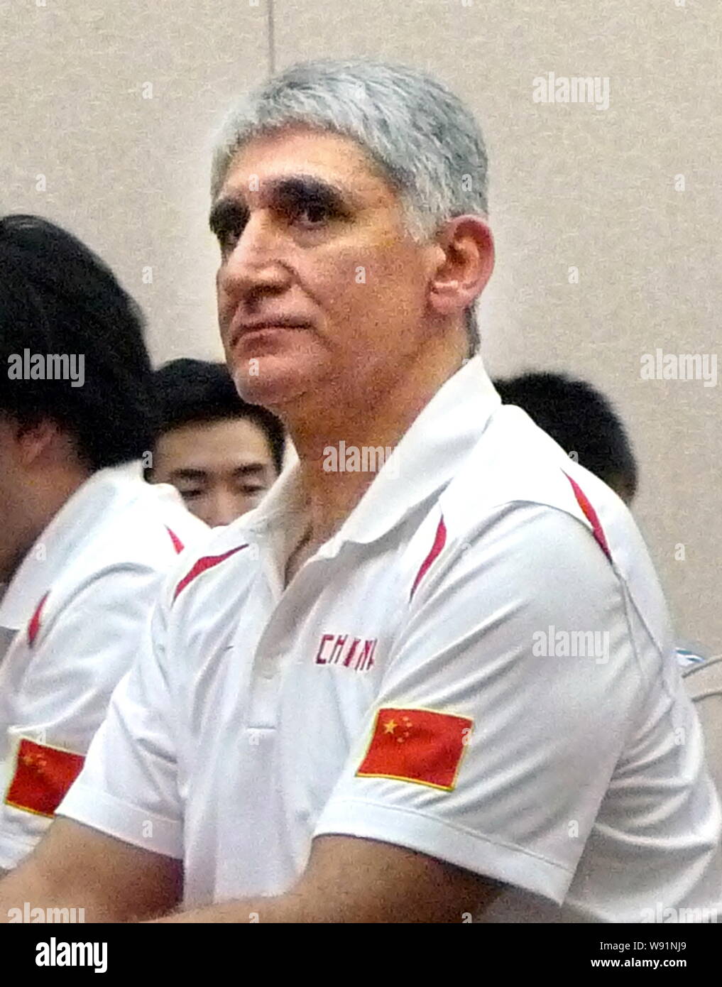 Panagiotis Giannakis,the new head coach of the China mens basketball team, attends a press conference for the Stankovic Continental Cup 2013 in Guangz Stock Photo