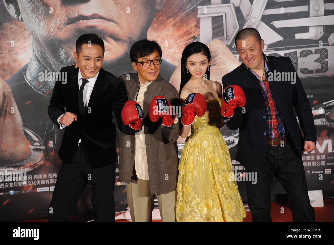 (From left) Chinese actor Liu Ye, Hong Kong actor Jackie Chan, Chinese actress Jing Tian and director Ding Sheng pose at a premiere for their new movi Stock Photo
