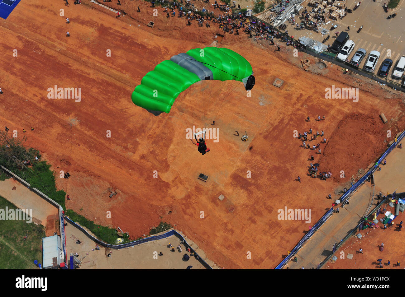 Austrian climber Michael Kemeter parachutes off the 268meterhigh