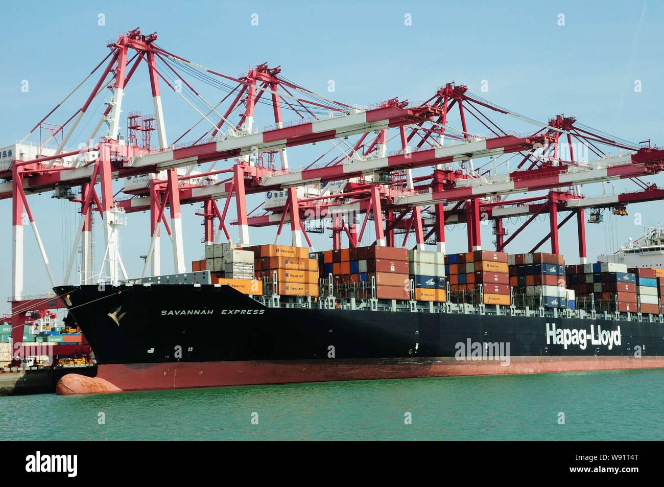 --FILE--Ocean-going cargo ships are seen at the port in Qingdao, east Chinas Shandong province, 18 April 2012.   Chinese exports and imports rebounded Stock Photo