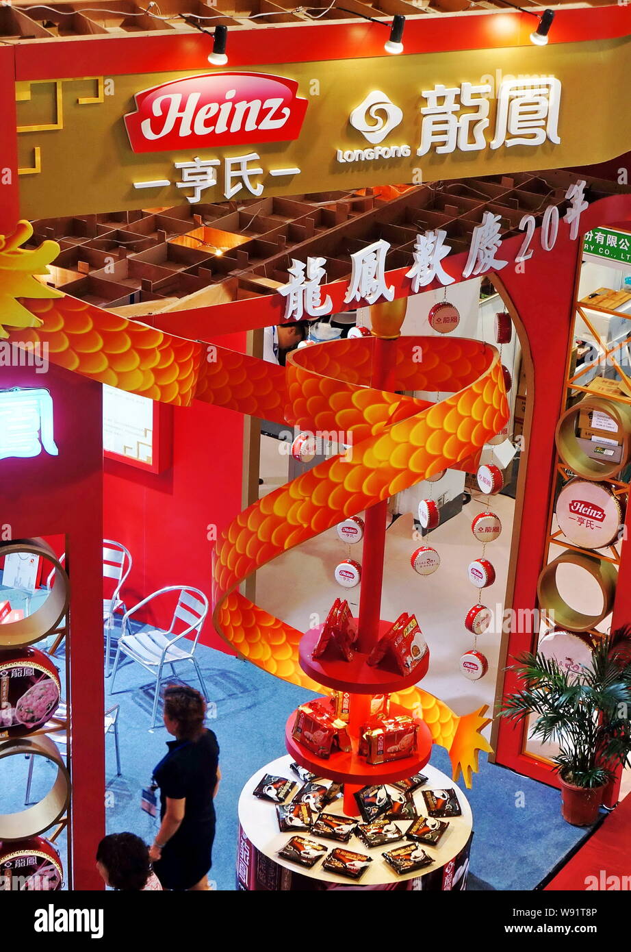 FILEPeople visit the stand of Shanghai Long Fong Co. under Heinz