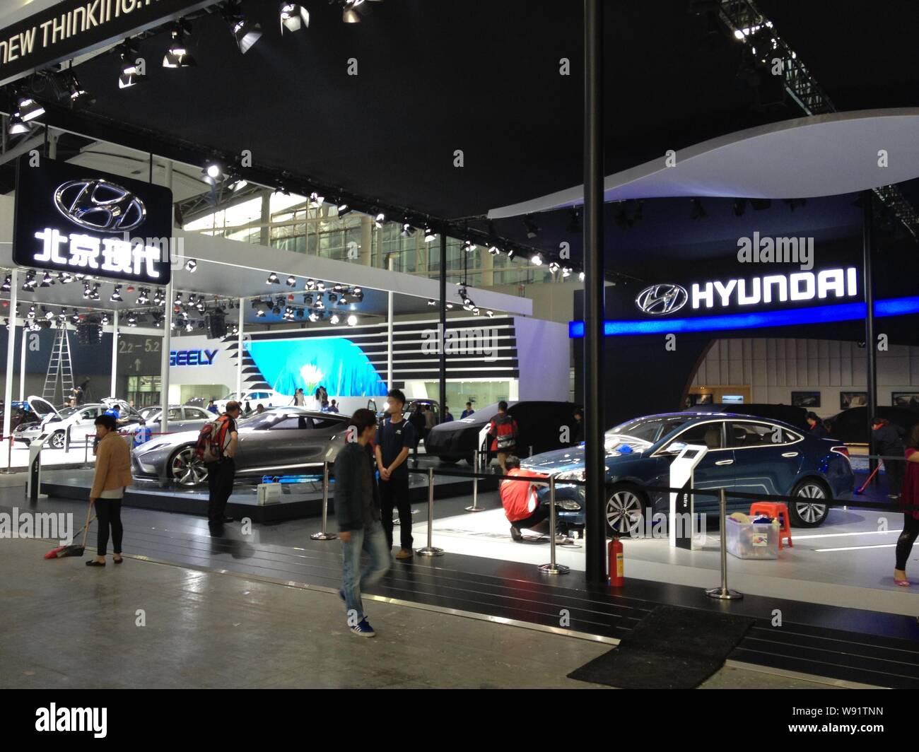 --FILE--People visit the stand of Beijing Hyundai, a joint venture of ...