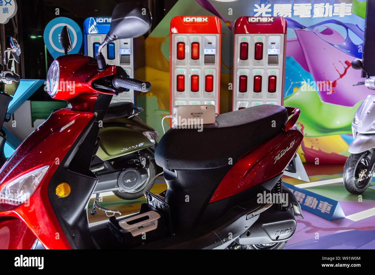 Taichung, Taiwan - August 4, 2019: Kymco IoneX battery-powered electric  scooter display with batteries and charging stations. Alternative energy  conce Stock Photo - Alamy