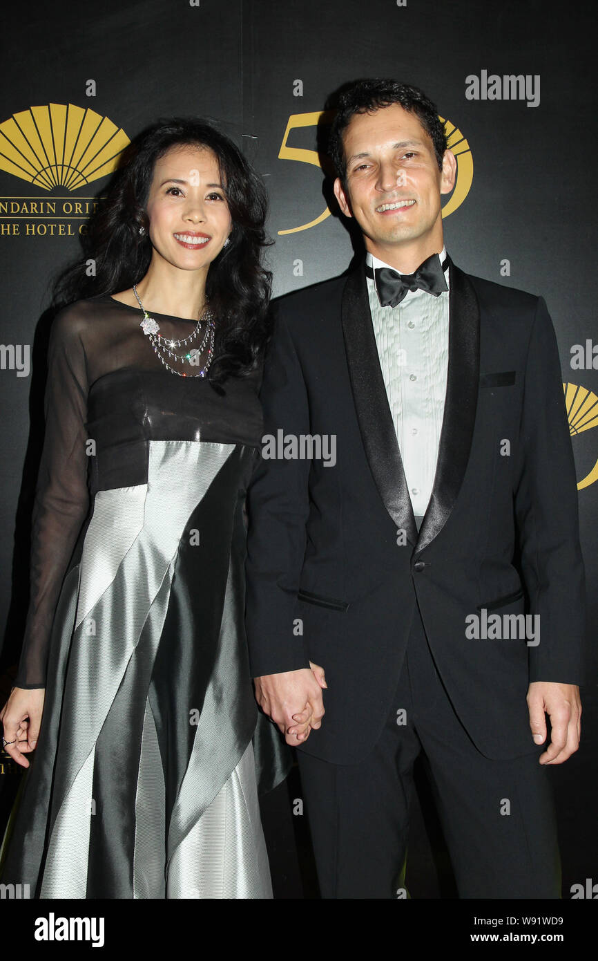 Hong Kong singer and actress Karen Mok, left, and her husband Johannes