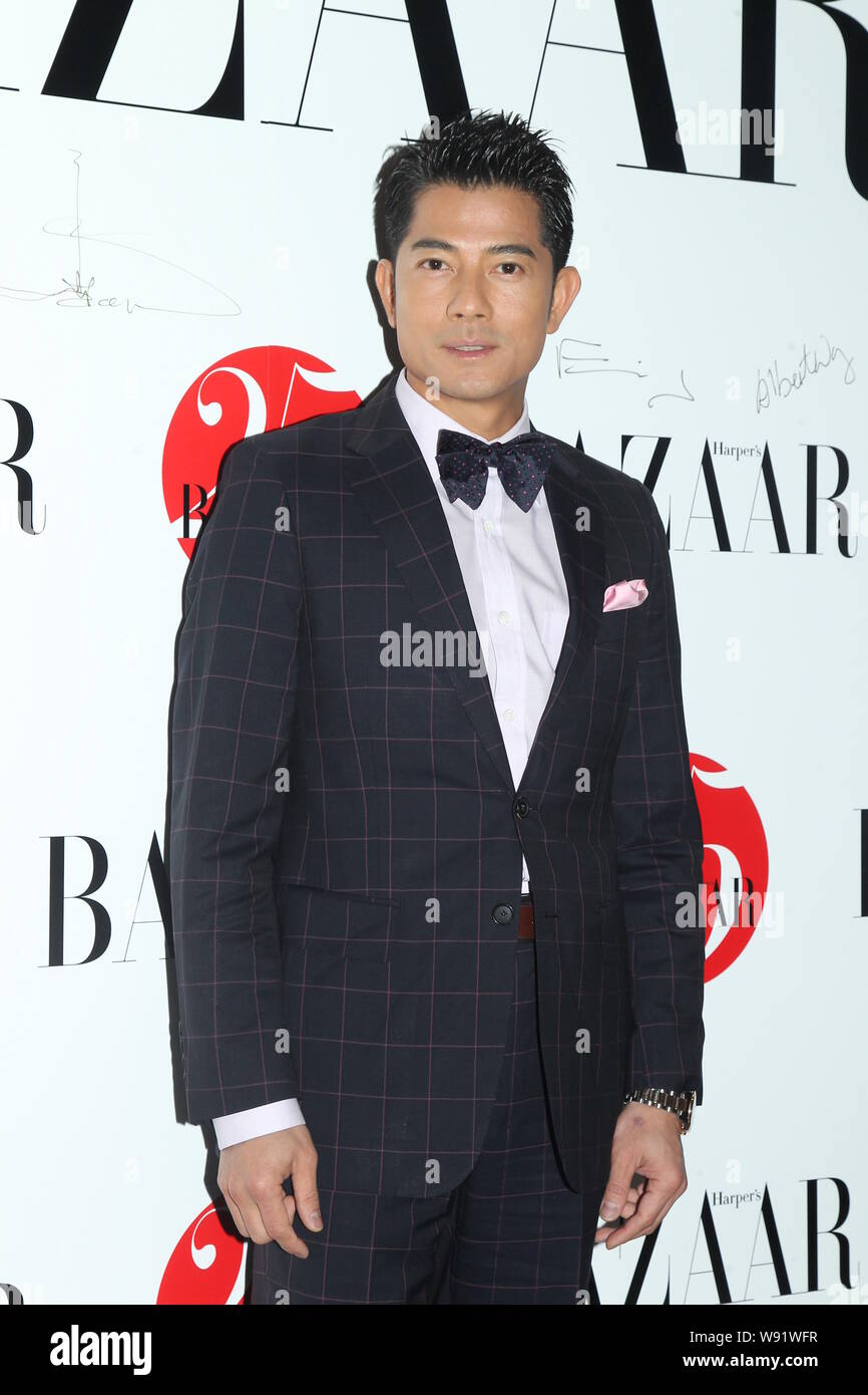 Hong Kong singer and actor Aaron Kwok poses during a celebration party ...
