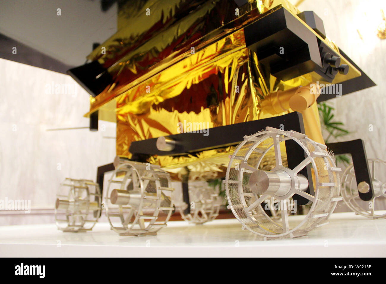 A model of Chinas first moon rover is displayed at a press conference for the rover in Beijing, China, 25 September 2013.   Chinese scientists unveile Stock Photo