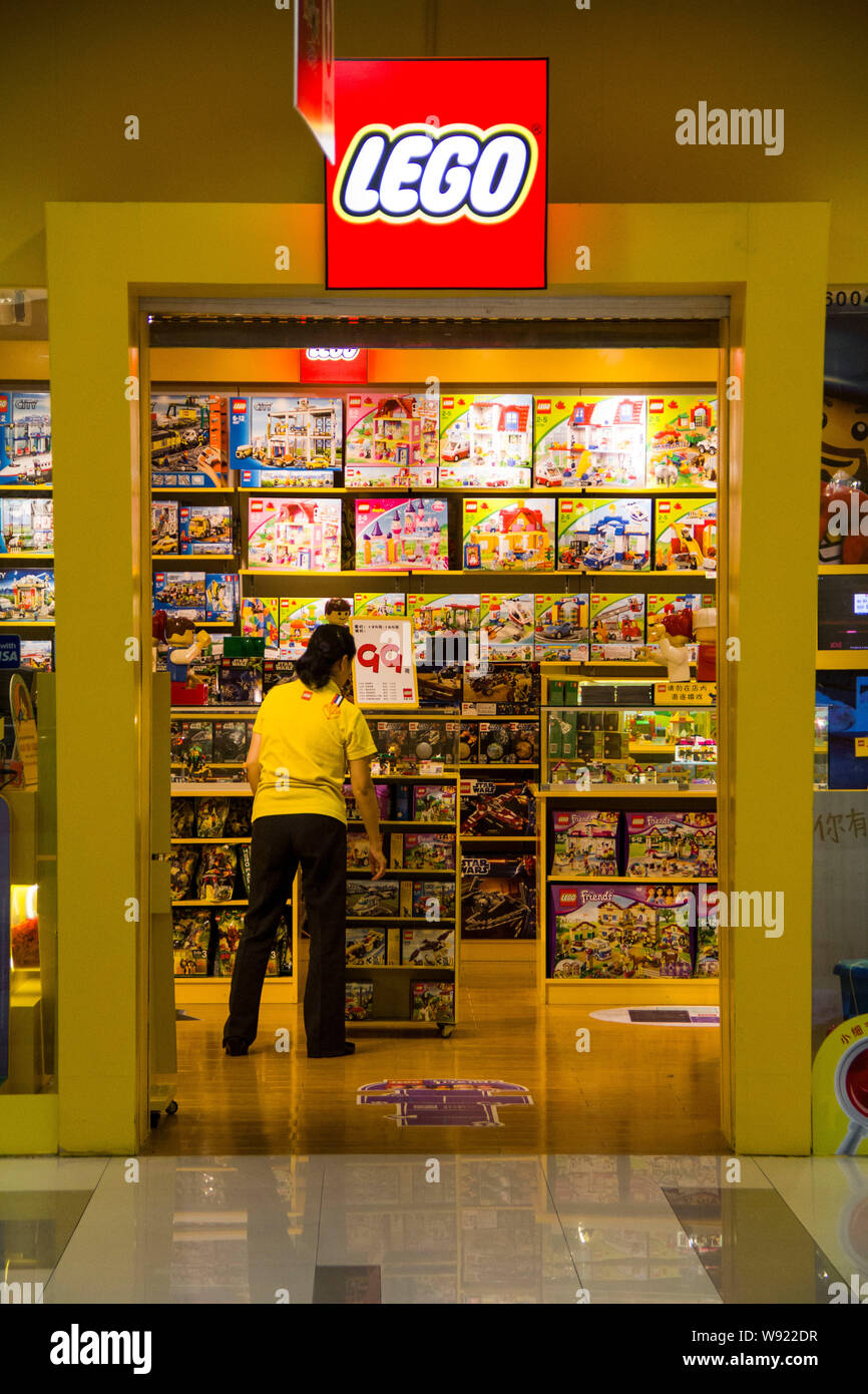 --FILE--A Chinese customer looks at Lego bricks at a store in Shanghai, China, 24 May 2013.   The European Unions Toy Safety Directive, considered the Stock Photo