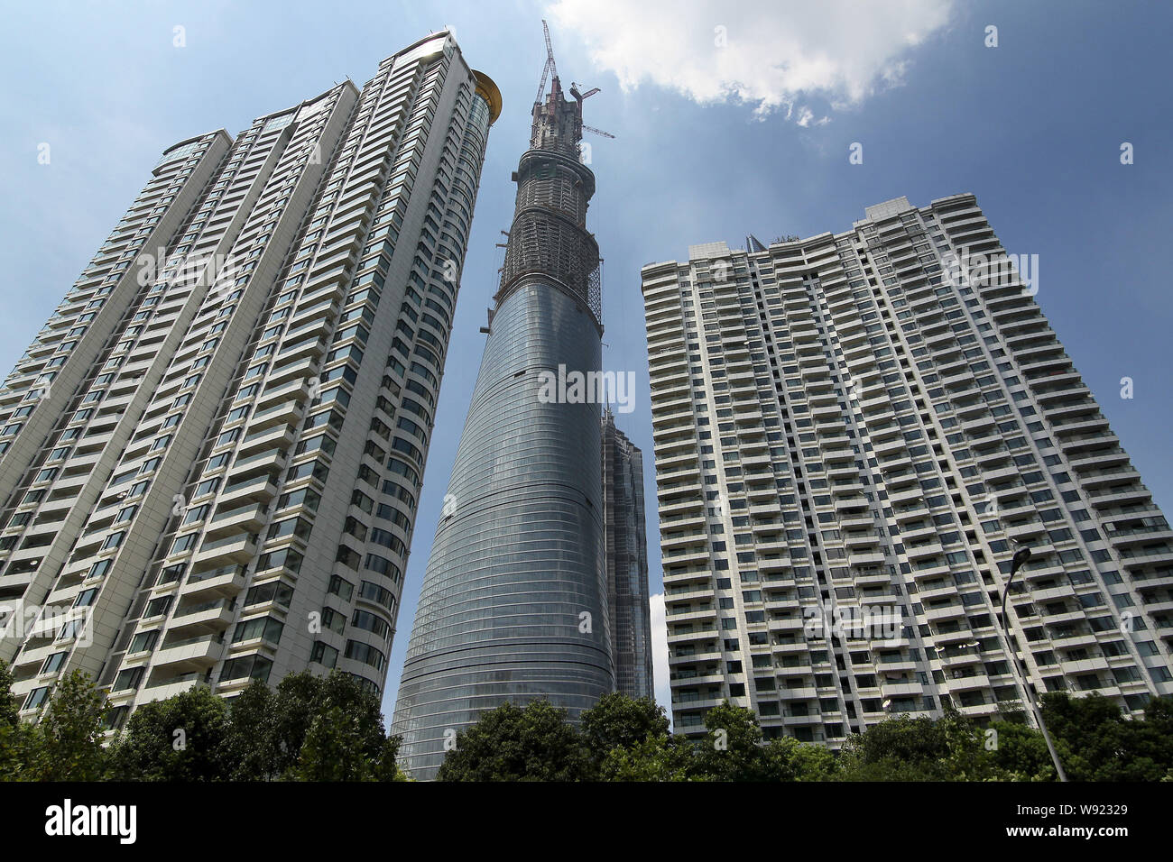The Shanghai Tower, center, is under construction in the Lujiazui ...