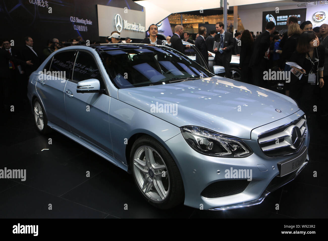 STRASBOURG, FRANCE - SEP 21, 2014: White Mercedes-Benz E Class taxi parked  on a rainy day in center of Strasbourg, place Kleber next to cafe Stock  Photo - Alamy