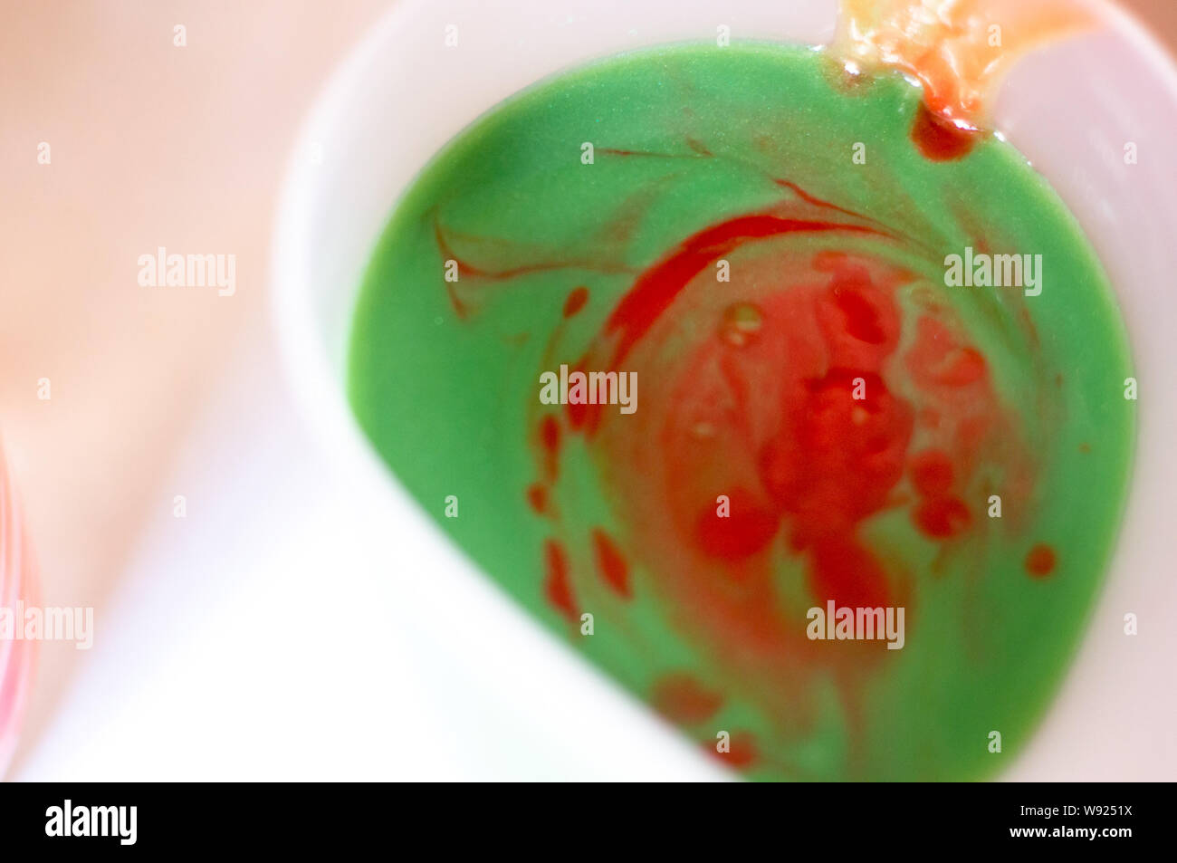 Mixing Red Green Mica Color Colorant Into The Oil Soap Mix To Make