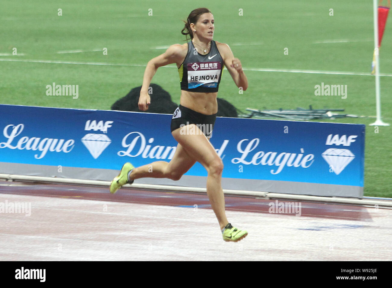 Zuzana Hejnova of The Czech Republic competes in the womens 400m hurdles event at the 2013 IAAF Diamond League in Shanghai, China, 18 May 2013. Stock Photo