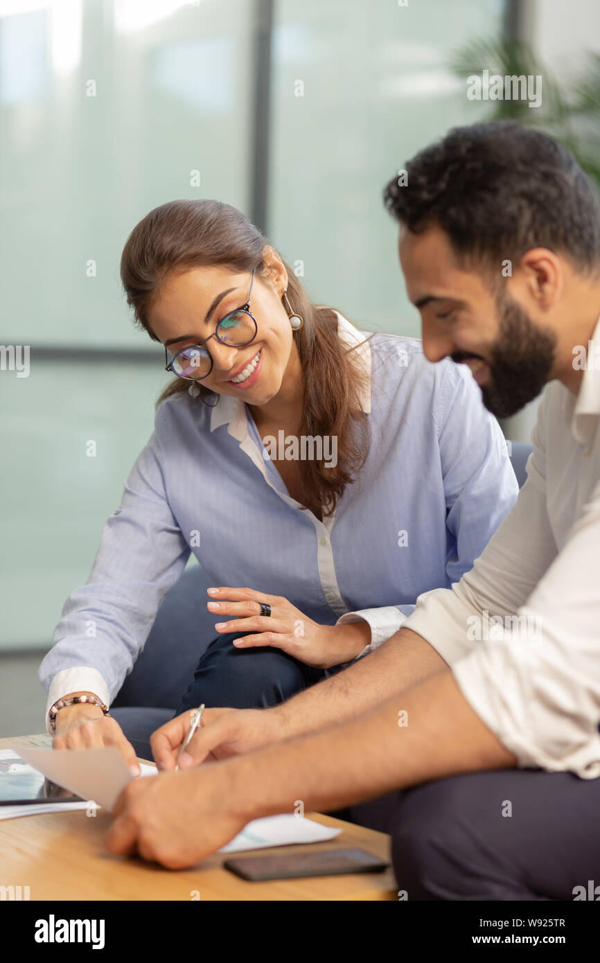 Close up of young people that working together Stock Photo