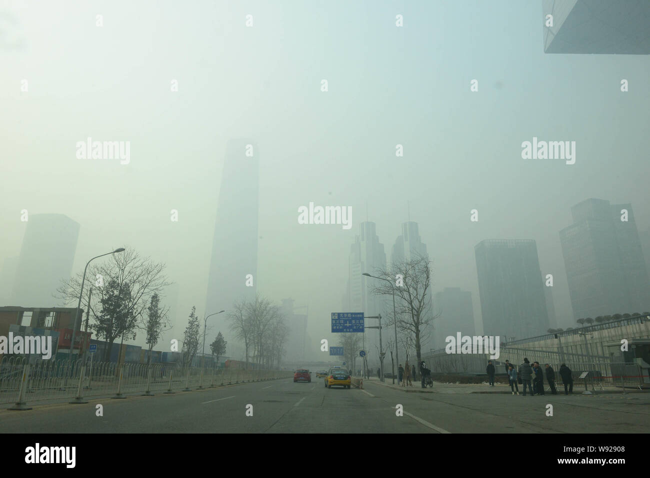 Skyscrapers near the East Third Ring Road are obscured by heavy smog in Beijing, China, 28 January 2013.   Air pollution went from bad to worse in Bei Stock Photo