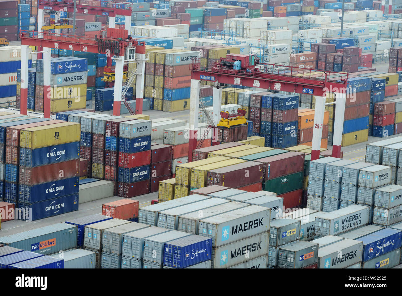 Containers are seen at the Qingdao port in Qingdao, east Chinas Shandong province, 8 May 2013.   Chinas exports and imports grew more than expected in Stock Photo