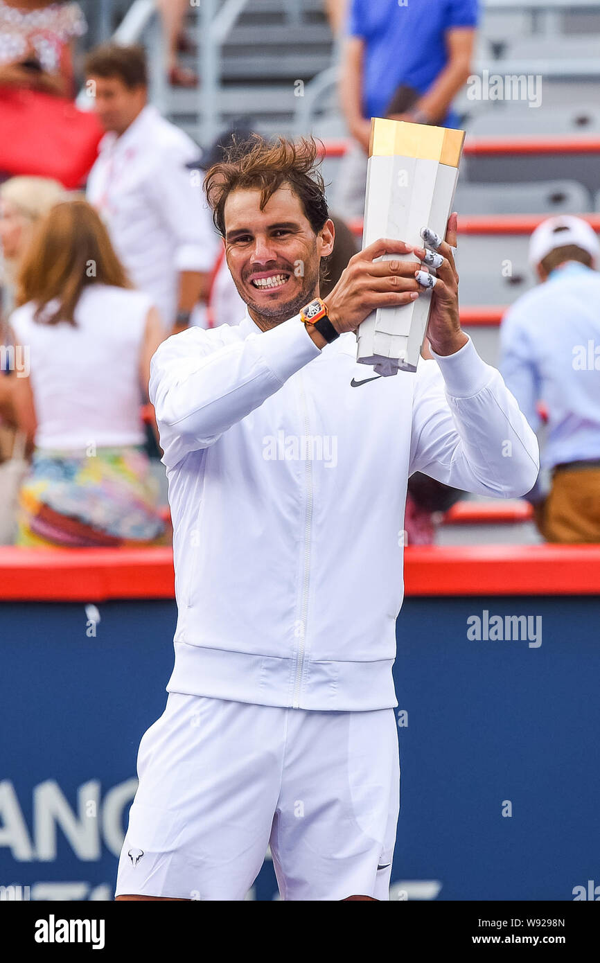 Montreal, Quebec, Canada. 11th Aug, 2019. Rafael Nadal (ESP) holding his  winner trophy up in the air after winning the ATP Coupe Rogers final match  against Medvedev on August 11, 2019 at