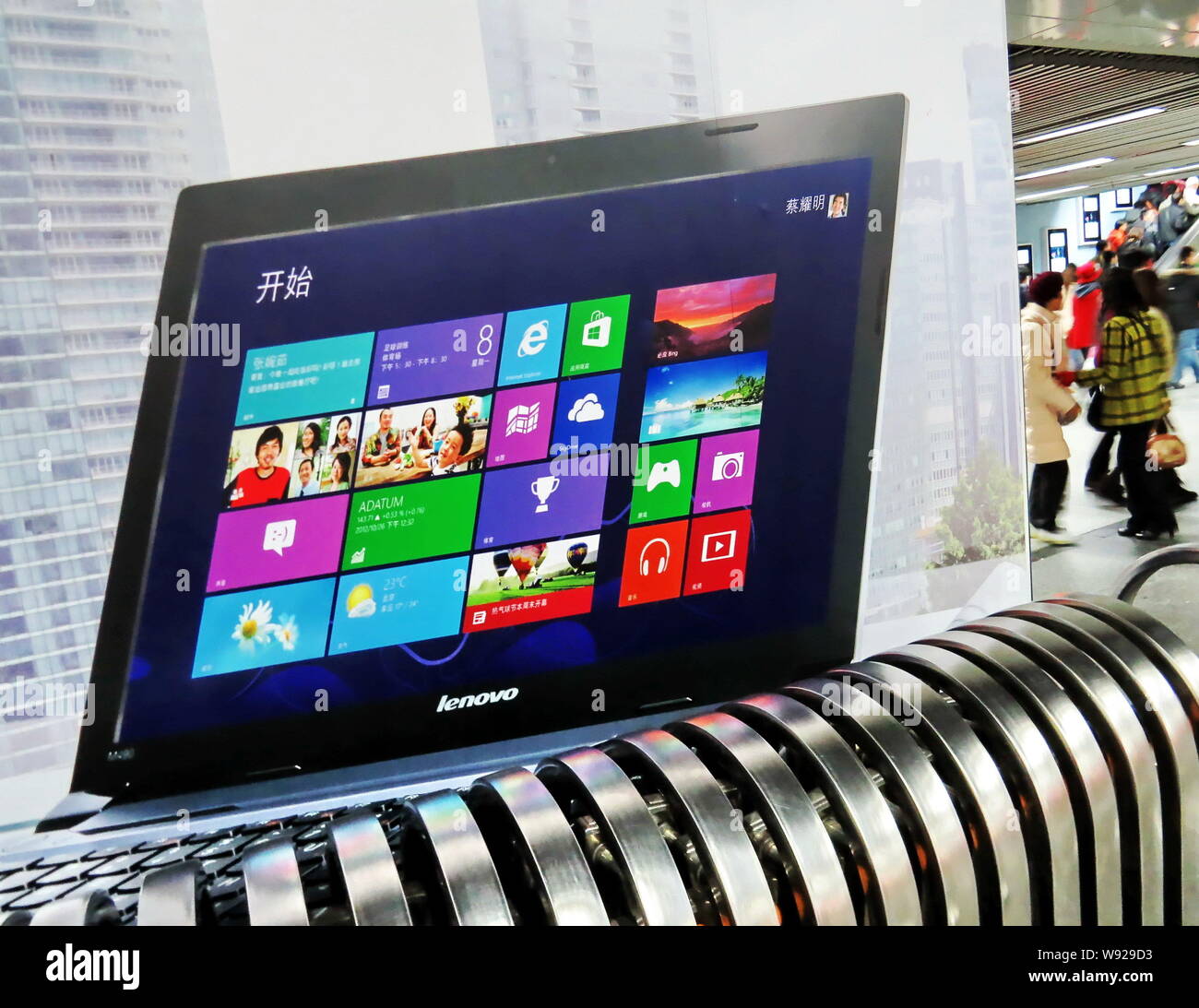 --FILE--An advertisement for Lenovo laptop computers is seen at a metro station in Shanghai, China, 27 January 2013.   For a company operating mostly Stock Photo