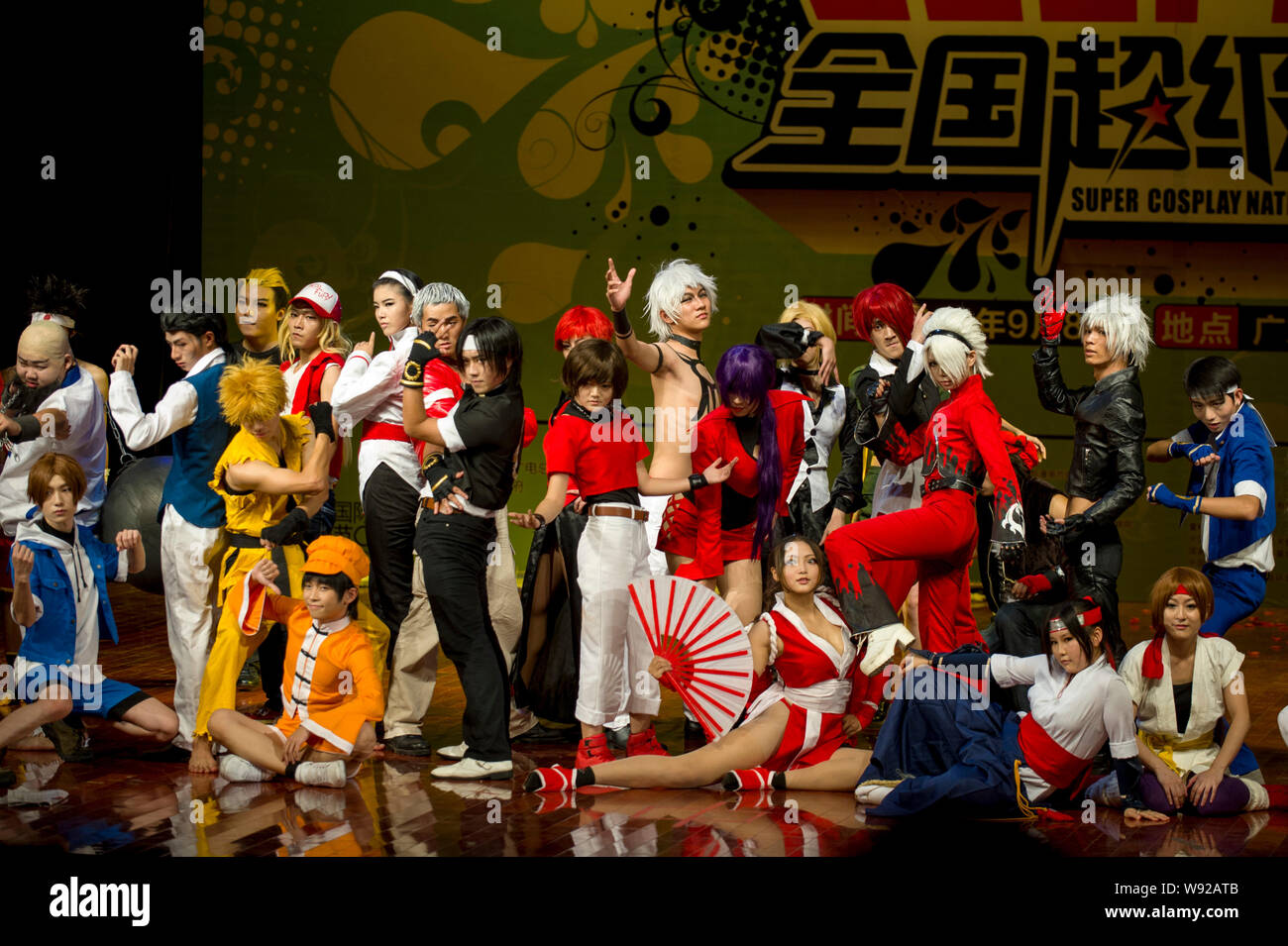 Chinese contestants dressed in the costumes of the figures in the electronic video game KOF (The King Of Fighters) perform in the final of the 10th Su Stock Photo
