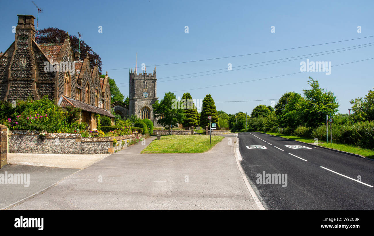 Dorchester, England, UK June 29, 2019 Sun shines on old cottages and