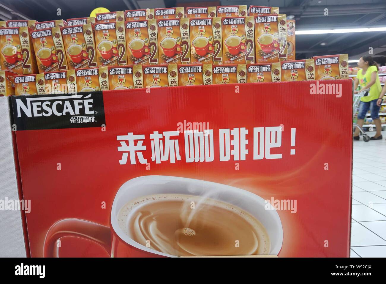 --FILE--Boxes of Nescafe of Nestle are displayed for sale at a supermarket in Xuchang, central Chinas Henan province, 7 July 2013.   Nestle SA, the wo Stock Photo
