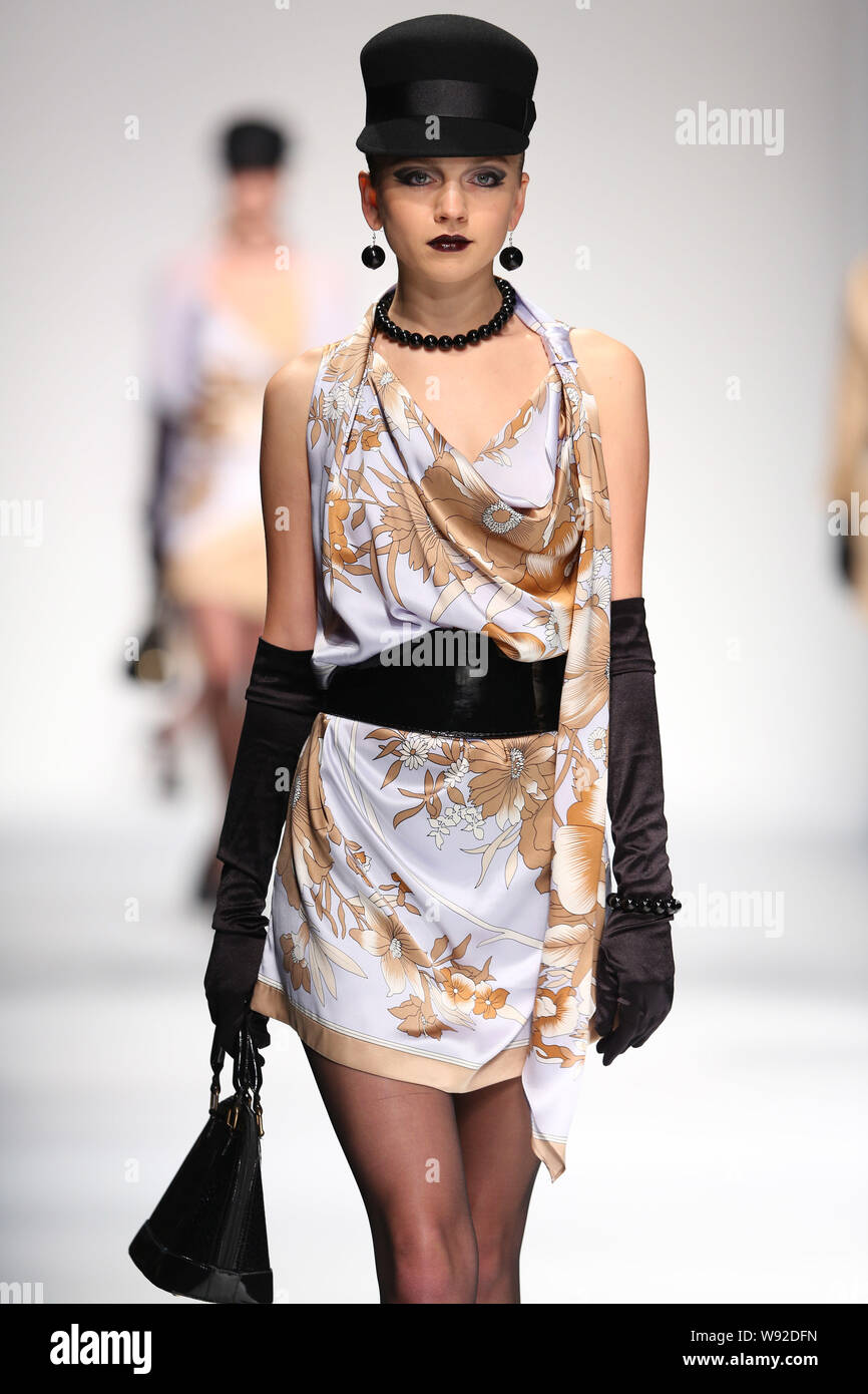 A model displays a new creation by designer Renato Nucci at his Renato Nucci-Inspired  by DS fashion show during the Shanghai Fashion Week Spring/Summe Stock  Photo - Alamy