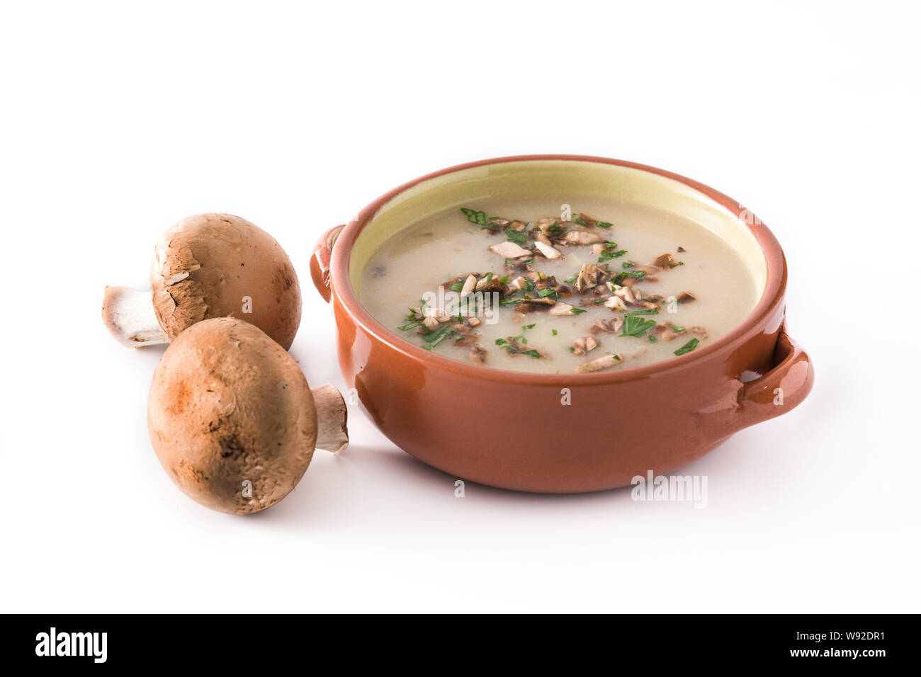 Homemade mushroom soup isolated on white background Stock Photo - Alamy