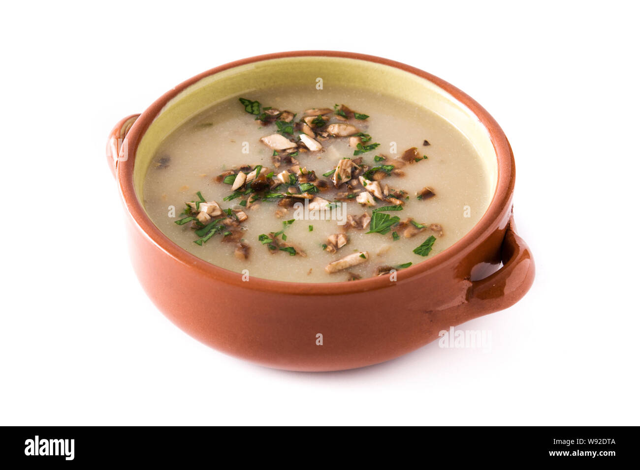 Homemade mushroom soup isolated on white background Stock Photo - Alamy