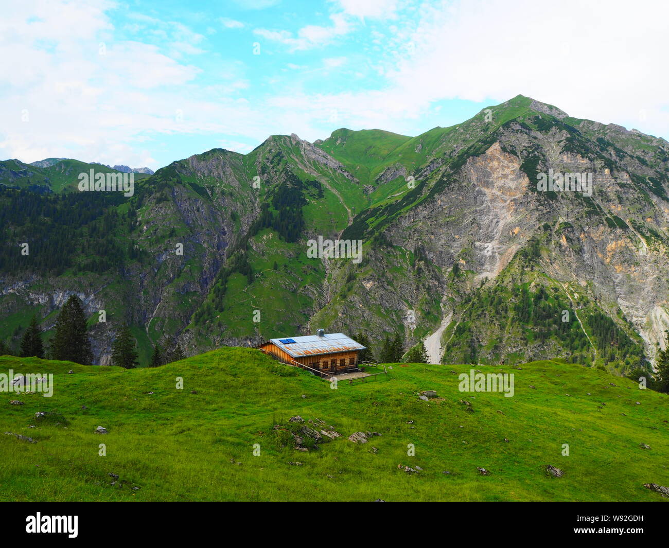 Small Mountain Hut in the Alps Stock Photo