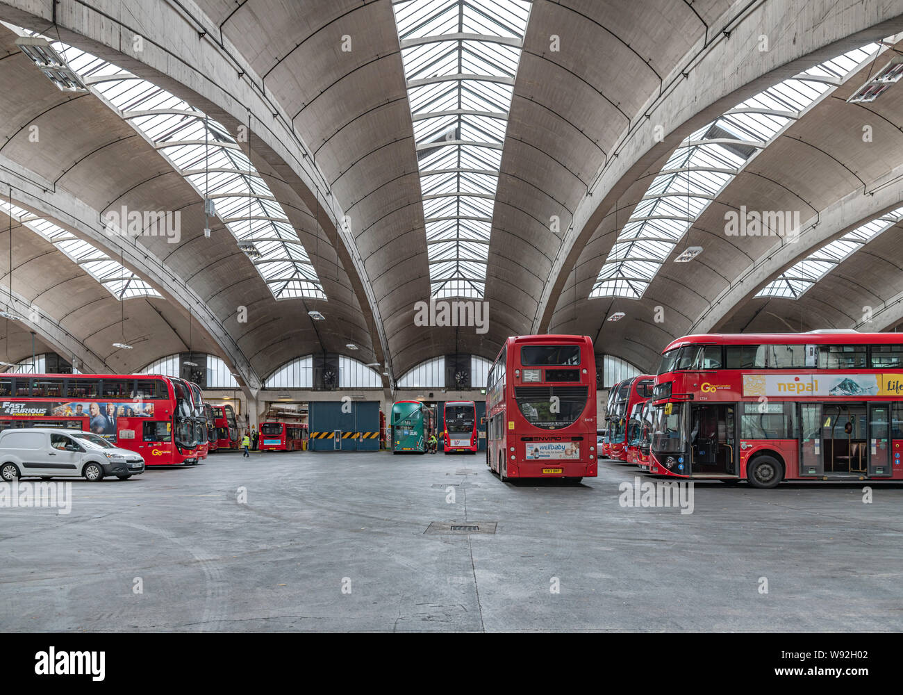 Stockwell Bus Garage opening in 1952 was then Europe's largest unsupported roof span. The garage provides unobstructed parking space for 200 buses. Stock Photo