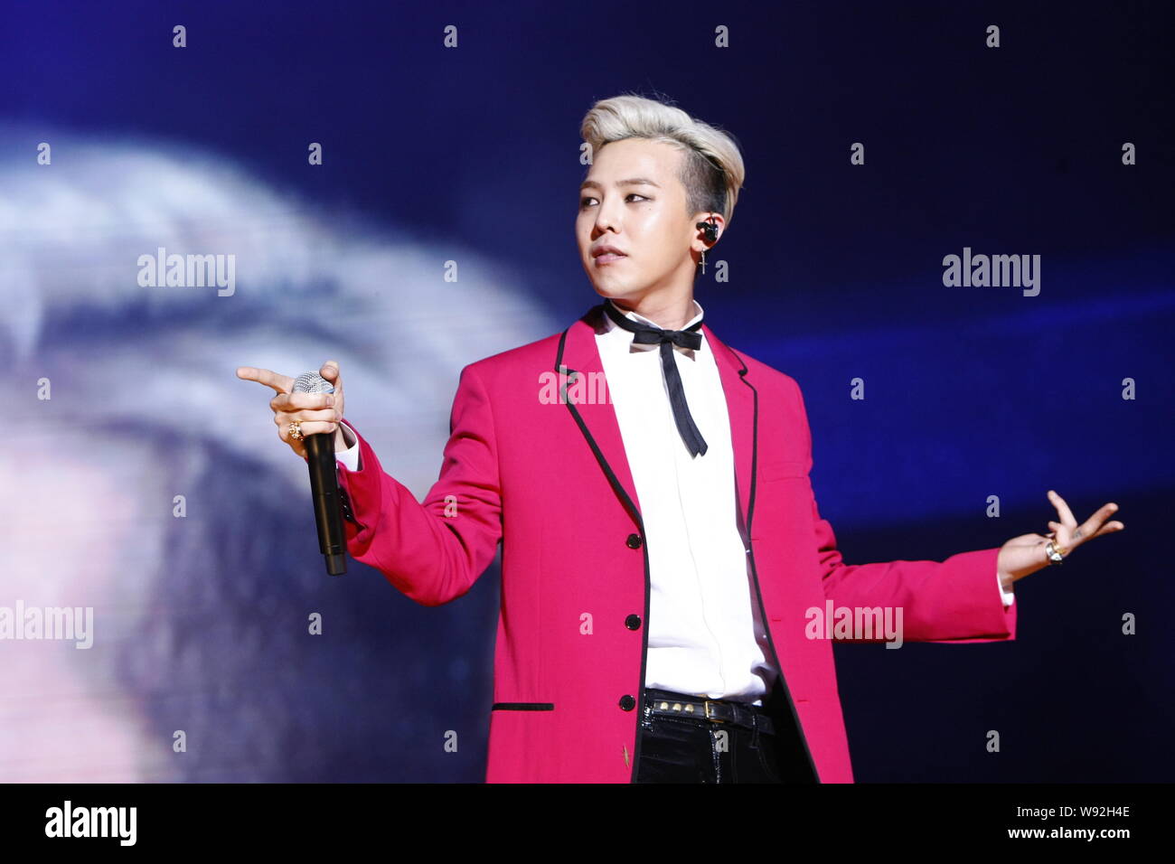 G-Dragon, leader and one of two rappers for the Korean group Big Bang, performs during Hong Kong actor and singer Jackie Chans concert in Hangzhou, ea Stock Photo