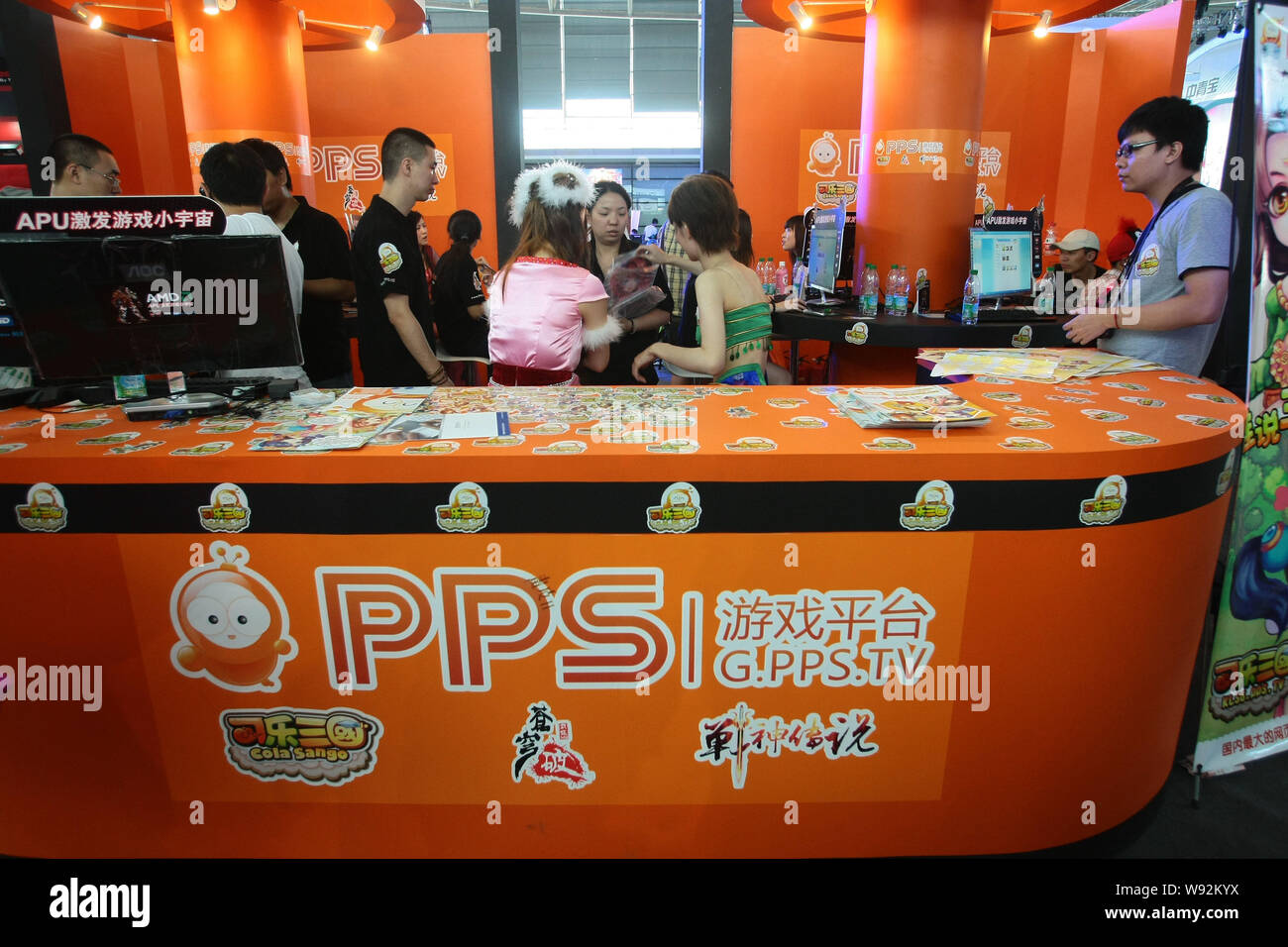 --FILE--People visit the stand of PPS.TV, a Chinese video website, during the 10th China International Digital Entertainment Fair in Shanghai, China, Stock Photo