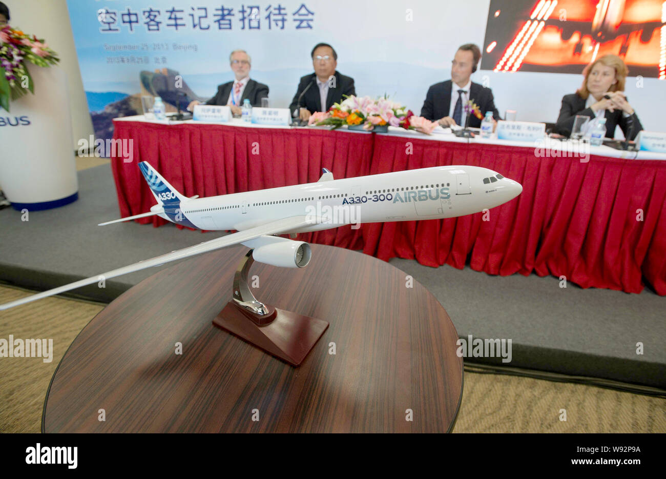 A model plane of the short-range regional version of Airbus A330-300 is displayed at a press conference during the Aviation Expo/China 2013 in Beijing Stock Photo